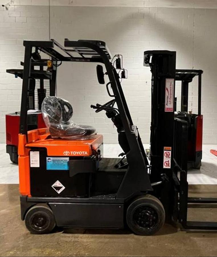 Opposite side view of 2019 Toyota 7FBCU18 electric forklift – CSA-certified 3,500 lb 4-wheel chassis with 189” triple mast, clamp-ready 4-way hydraulics, and cushion tires shown reconditioned with used 36V battery option available in Brampton ON – Premier Lift Equipment