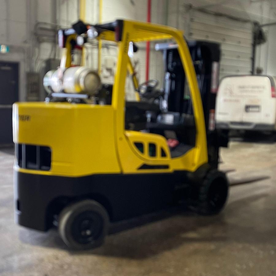 Opposite side view showing LPG tank mount and CSA-certified labeling