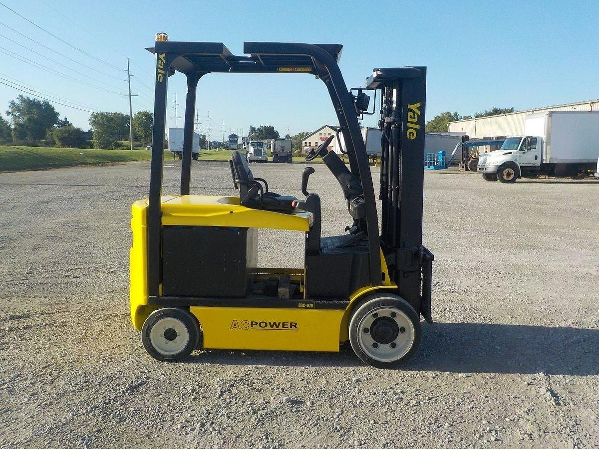 Side view of refurbished 2012 Yale ERC070 electric forklift showing operator cab, chassis, and quad mast during Brampton deployment