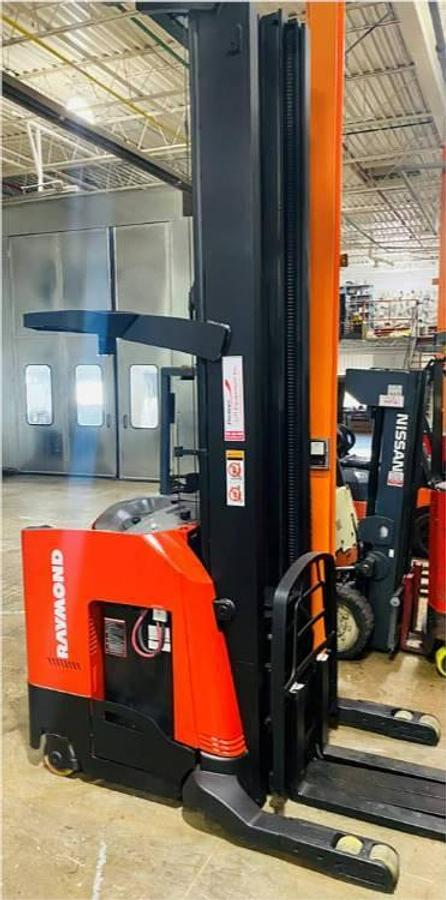 Refurbished 2014 Raymond 750R45TT electric reach truck with CSA certification and new paint deployed in Mississauga for narrow aisle warehouse operations