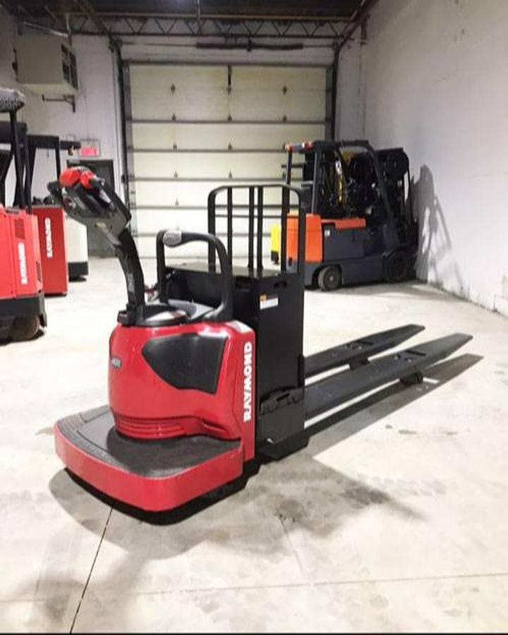 2012 Raymond 8410 CSA electric rider pallet jack Brampton 6000 lb 96” forks Long John freezer compatible export certified battery charger optional
