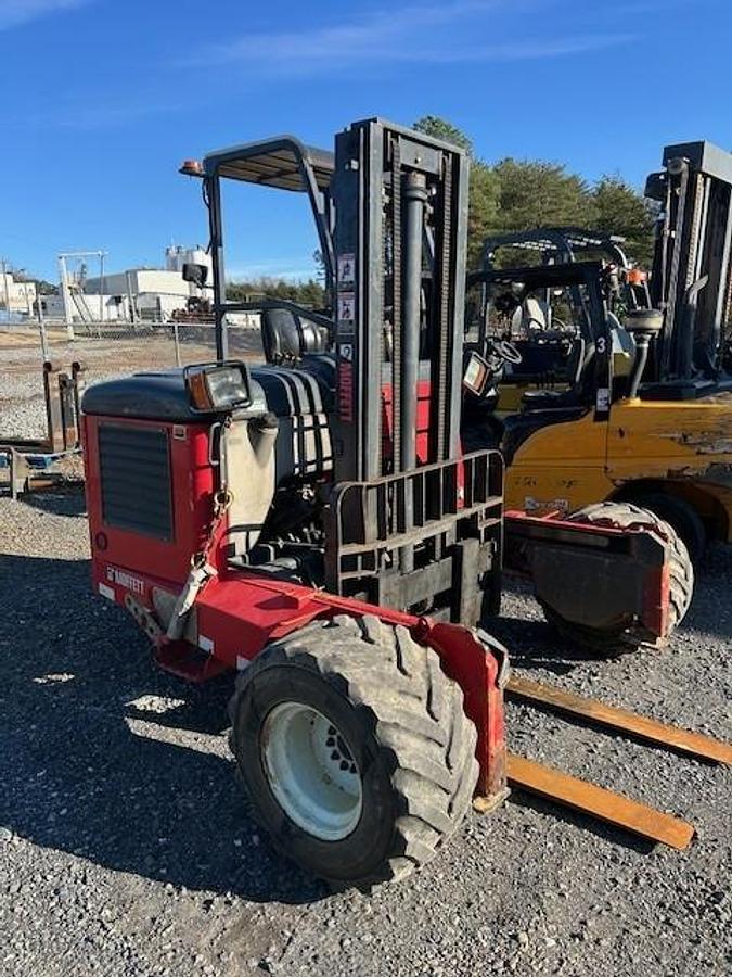 “2010 Moffett M55 opposite front angle – piggyback forklift – diesel – 10 ft mast”