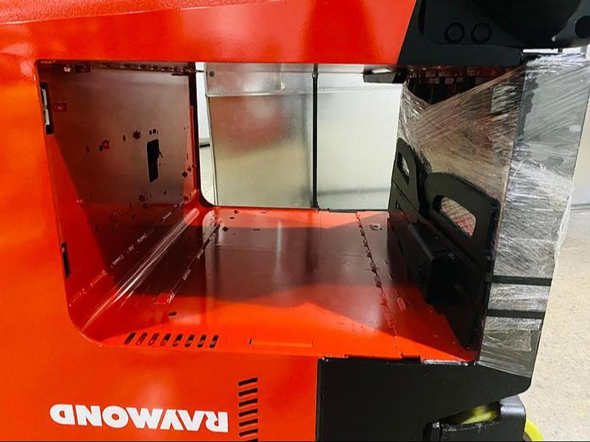 Battery compartment of Raymond 750‑DR32TT sized for 36‑volt industrial battery