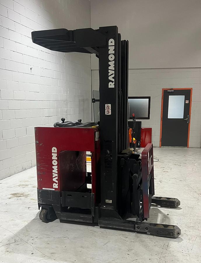 Side View: Budget Raymond reach truck with cushion tires and side shift