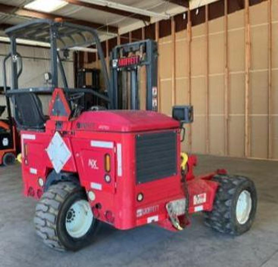 Rear angle view of refurbished 2016 Moffett M8 55.3NX truck‑mounted forklift — 5,500 lb capacity, diesel power
