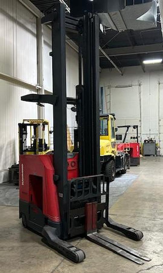 “Raymond 750‑R45TT stand‑up reach truck opposite front angle view – reach mast, sideshift carriage, 4,500 lb electric warehouse reach truck – Brampton ON”