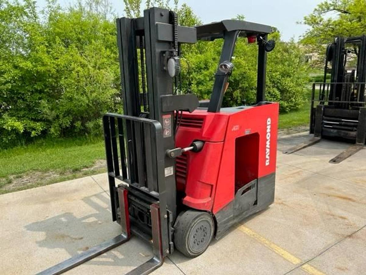 Opposite side view of refurbished 2012 Raymond 445-C30TT electric docker showing reach mechanism, drive unit cover, and chassis structure during Toronto deployment