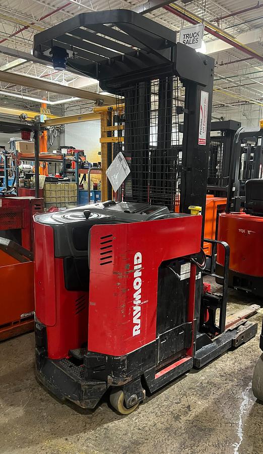 2015 Raymond EZ‑R40TT single reach – rear side angle view – 4,000 lb capacity – 211 inch lift – 36V electric narrow‑aisle reach truck