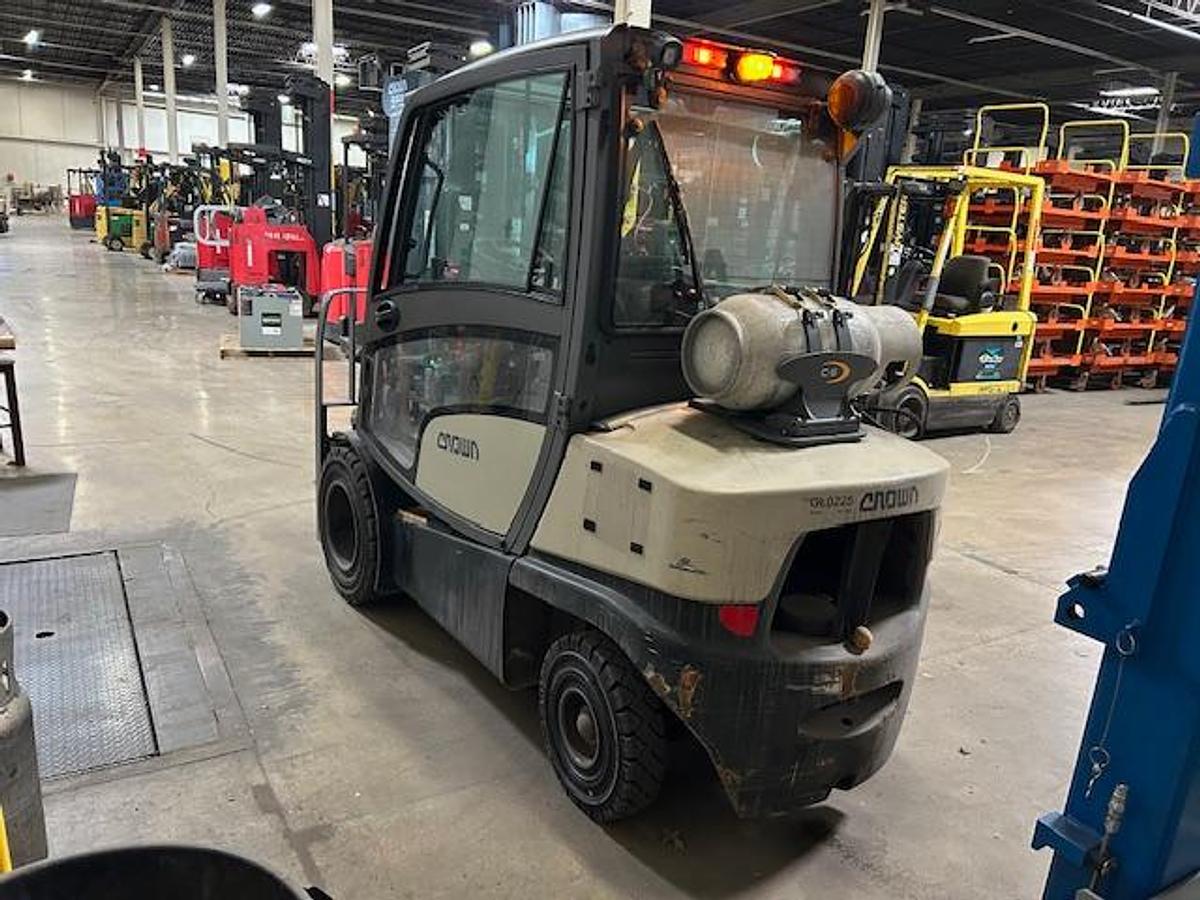 Rear angle view of Crown C5-1050-60 propane forklift – CSA-certified 6,000 lb outdoor unit with full steel cab, 187” triple mast, and solid pneumatic tires – Premier Lift Equipment Brampton ON