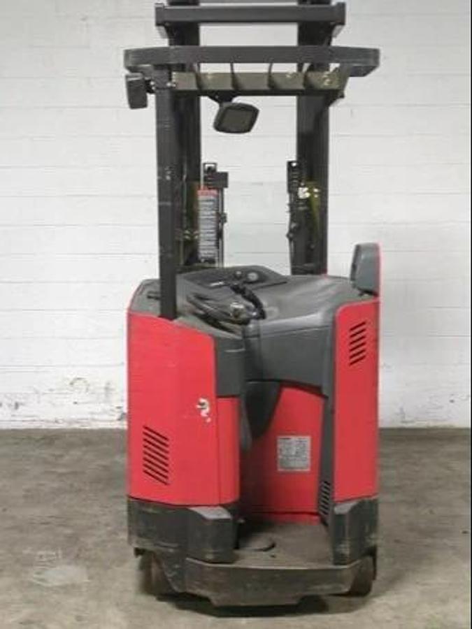 Rear view of 2019 Raymond 750-DR32TT stand-up electric forklift – CSA-certified 3,200 lb chassis with overhead guard, rear panel, and safety lighting shown refurbished and sold chassis-only, compatible with 36V battery install – safety-tagged in Brampton ON – Premier Lift Equipment