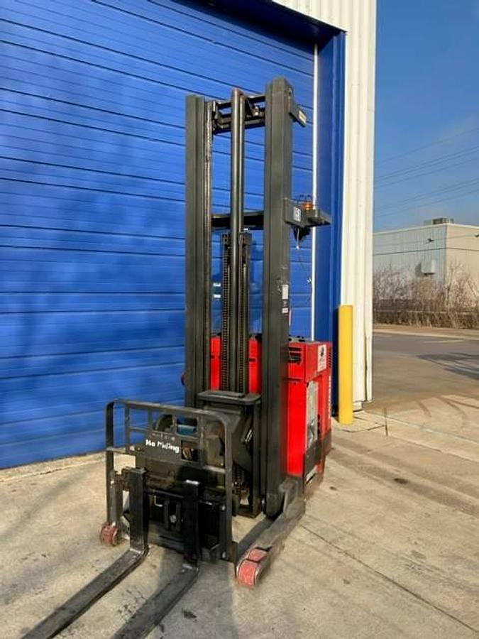 Front angle view of refurbished 2014 Raymond EASI-R40TT electric reach truck showing mast, forks, side shift carriage, and CSA inspection tag during Vaughan deployment