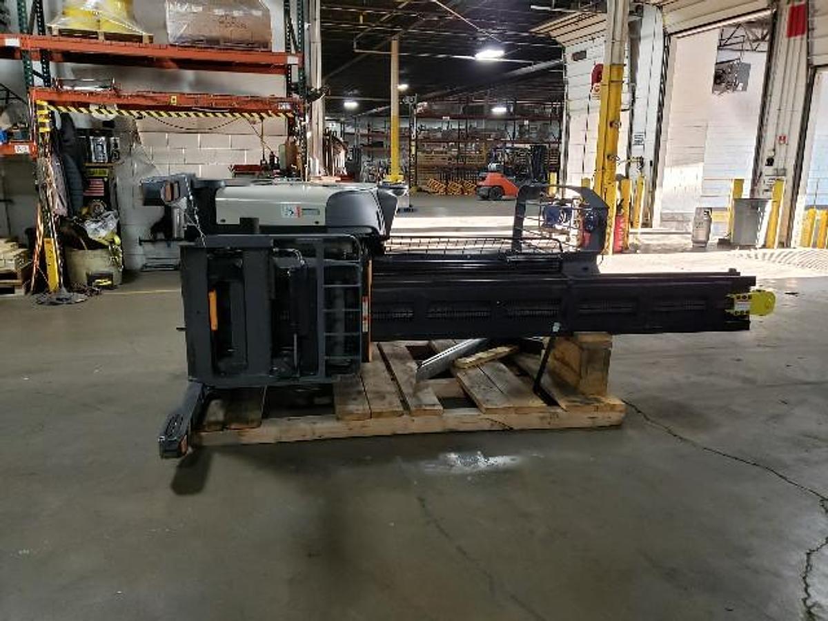 Front view of laid down mast on 2021 Crown RMD6025-32 Reach Truck | TSU triple-stage mast | fork carriage, tilt cylinders, and inner rails visible | CSA Certified | Brampton ON