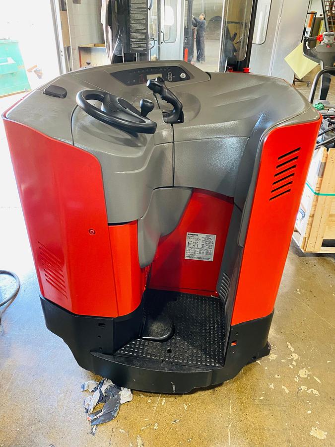 Operator compartment view showing stand-up controls and ergonomic handle