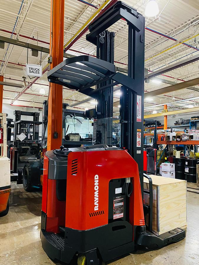 Angled view of 2006 Raymond 740‑R35TT, 3,500 lb, 36V electric reach truck, CSA/MOL certified.