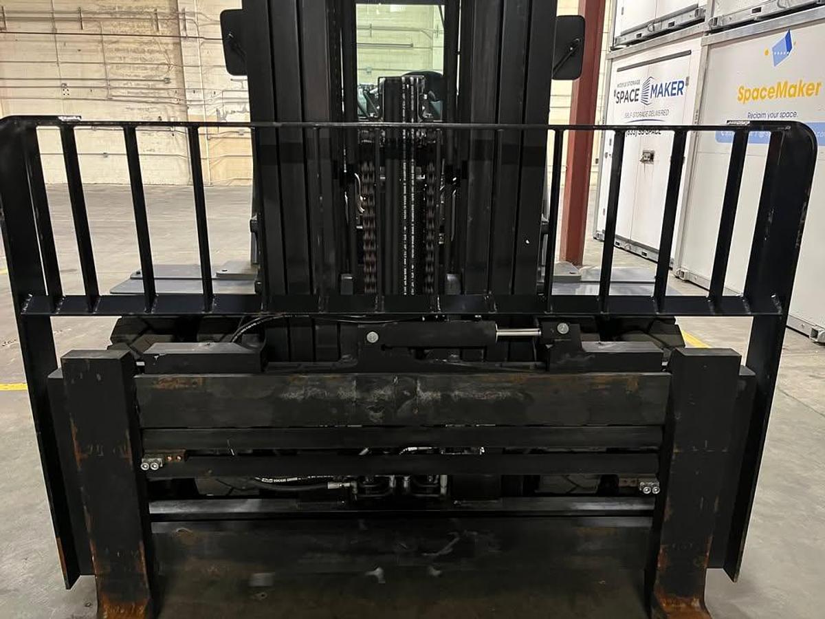 Front angled view showing mast rails,load back rest with attachment