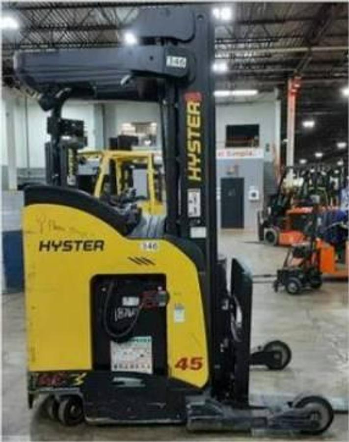 Side view of refurbished 2018 Hyster N45ZR2 electric reach truck showing 224" mast, 42" forks with load backrest, cushion tires, and CSA certification decal during Ontario deployment.