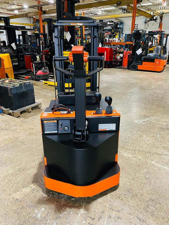 Toyota 6BWC15 – direct rear view – counterweight, rear guard, and built-in charger port – CSA-certified electric forklift – Brampton ON