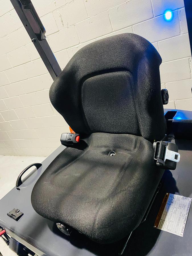 Toyota 8FBCU25 – close-up of suspension seat and operator controls – EE-rated electric forklift – Brampton ON