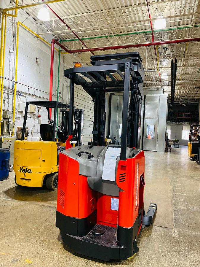 Rear chassis of Raymond 740-DR32TT showing 36V battery compartment and baseleg opening