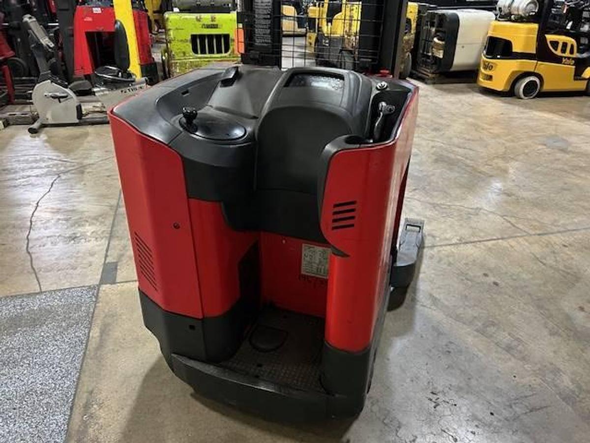 Operator compartment view showing stand-up controls and side-stance layout