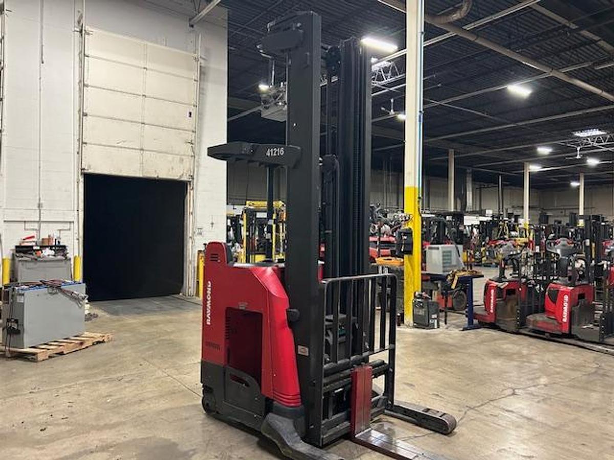 Front angled view showing mast rails and fork tips