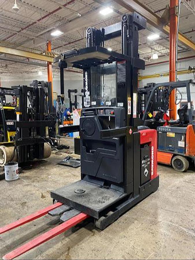 alt="2017 Raymond 540-OPC30TT CSA Certified Electric Order Picker angled front side view, reconditioned, no wire guidance"