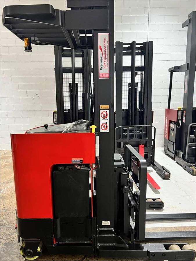 Refurbished 1999 Raymond EASIR30TT electric reach truck with CSA certification and new paint deployed in Mississauga for narrow aisle warehouse operations