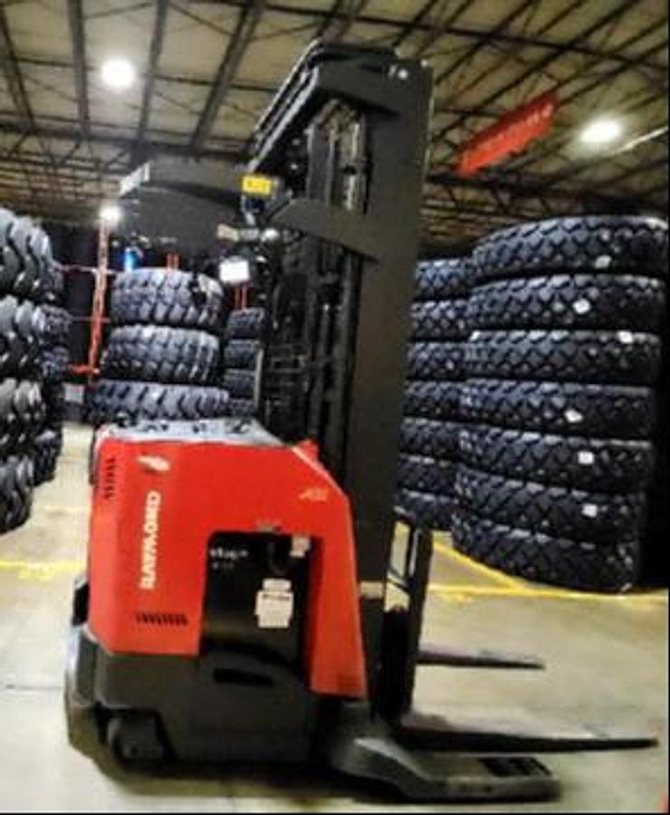 Fleet side view of Raymond 750-R45TT electric reach trucks – up to six CSA-certified 4,500 lb single-reach forklifts with 268” triple masts and side shift, staged in Brampton ON for matched deployment – Premier Lift Equipment
