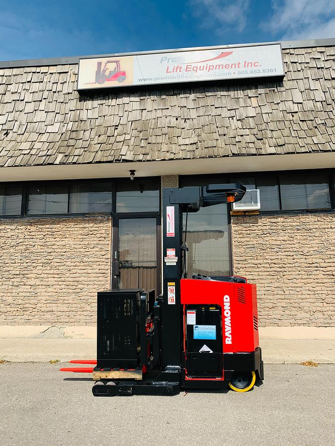 Refurbished 2008 Raymond EASIR40TT electric reach truck with CSA certification and new paint deployed in Mississauga for narrow aisle warehouse operations