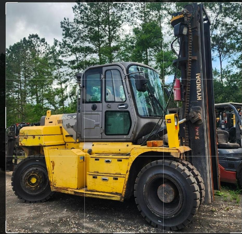 2016 Hyundai 130D-9 30,000 lb diesel pneumatic forklift with full cab and side shifting fork positioner