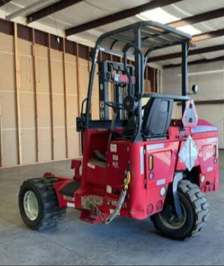 Opposite rear angle view of 2016 Moffett M8 55.3NX — foam‑filled tires, 45" forks, 5‑way hydraulics