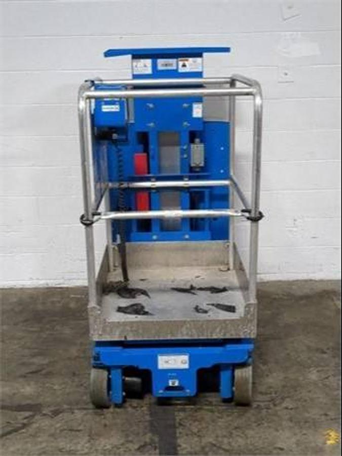 Genie GR-12 – front view – vertical mast, operator platform, non-marking tires – electric man lift – CSA certified – Brampton ON