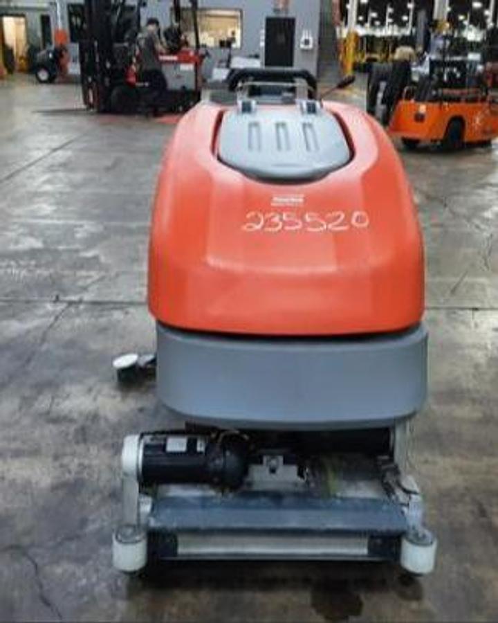 Front view of 2023 PowerBoss Phoenix 26 walk-behind floor scrubber featuring 26-inch scrub deck