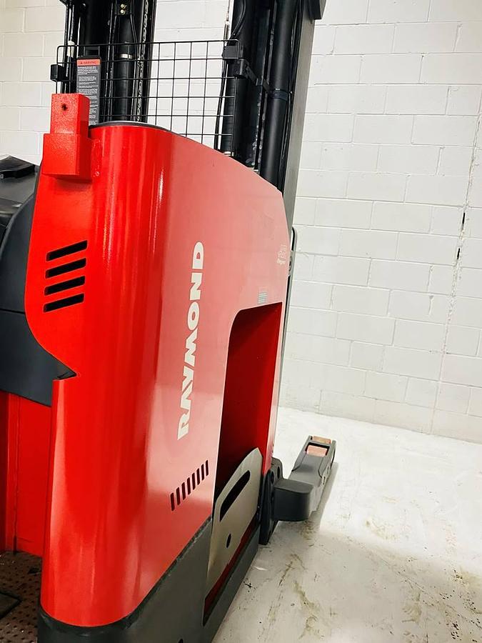 Close-up of side panel on 2022 Raymond 752-R45TT freezer reach truck showing CSA certification decal, chassis detail, and freezer-rated finish – unit staged in Brampton ON