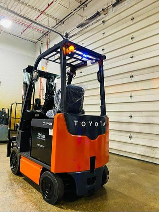 Rear view of 2016 Toyota 8FBCU20-COMP electric forklift – CSA-ready 4,000 lb compact chassis with rear counterweight, overhead guard, and cushion tires shown reconditioned with new 36V battery upgrade option available in Brampton ON – Premier Lift Equipment