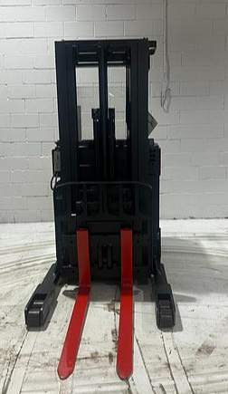 Front view of Raymond 31I‑R45TT Budget reach truck — mast, carriage, and poly tires visible.