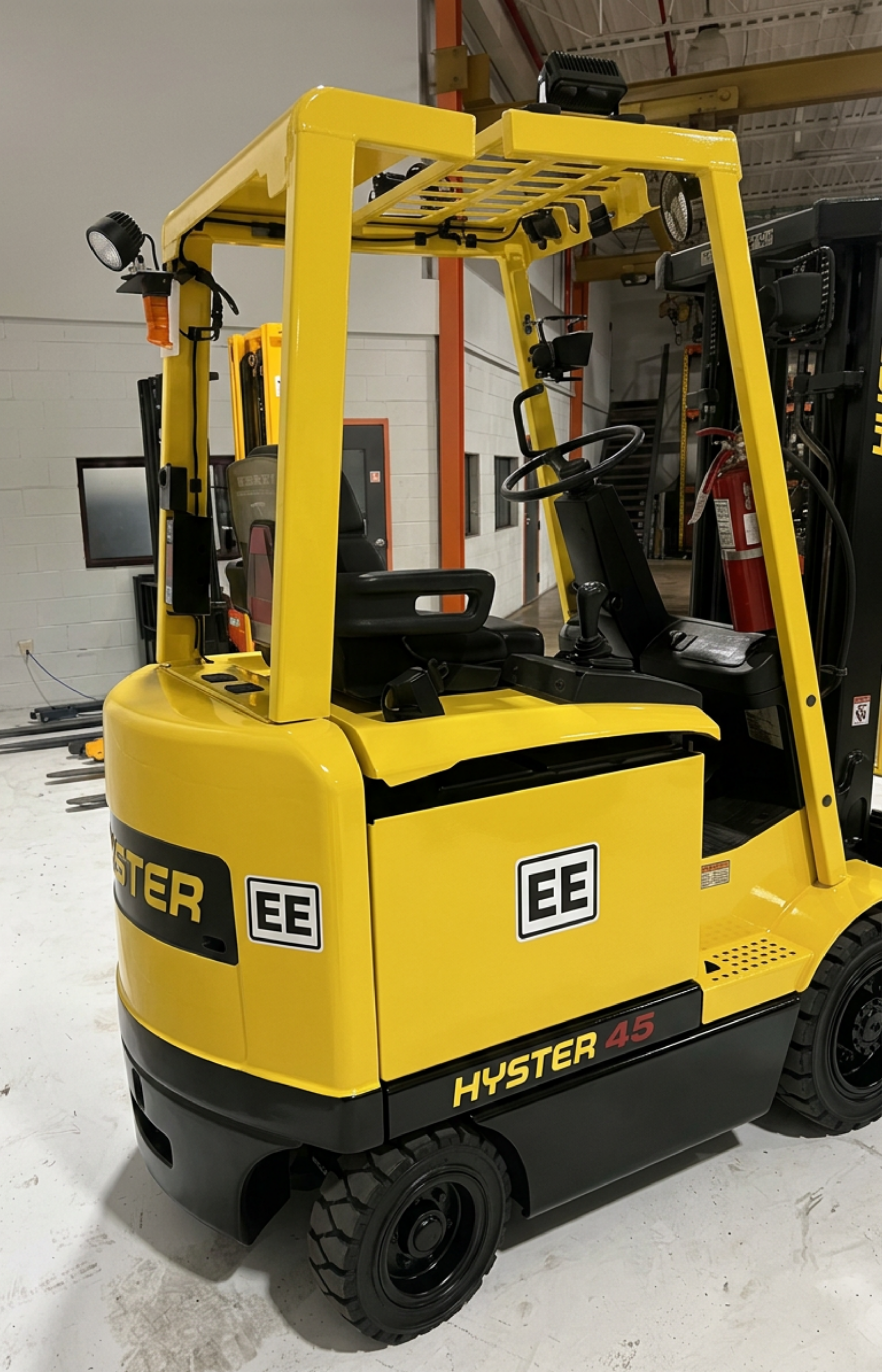 Rear view of Budget Hyster E45XM‑27 showing counterweight and chassis.