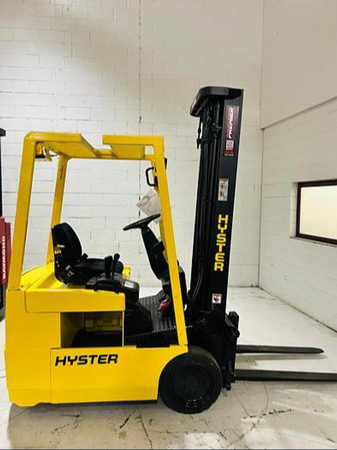 Opposite side view of Budget Hyster J30XMT older electric forklift, non‑CSA.