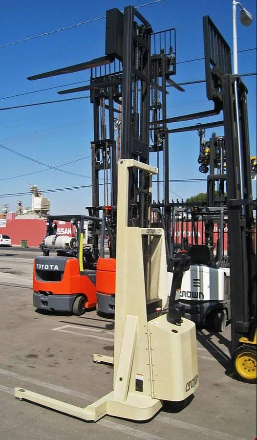 Crown W2T-130 – rear angle view – built-in charger, battery compartment, and CSA decal set – walkie straddle stacker – Brampton ON