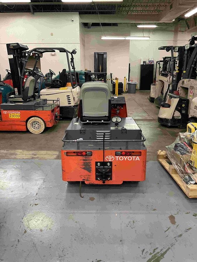 “Rear view of 2020 Toyota CBT6 electric tugger showing tow hitch assembly and counterweight housing.”