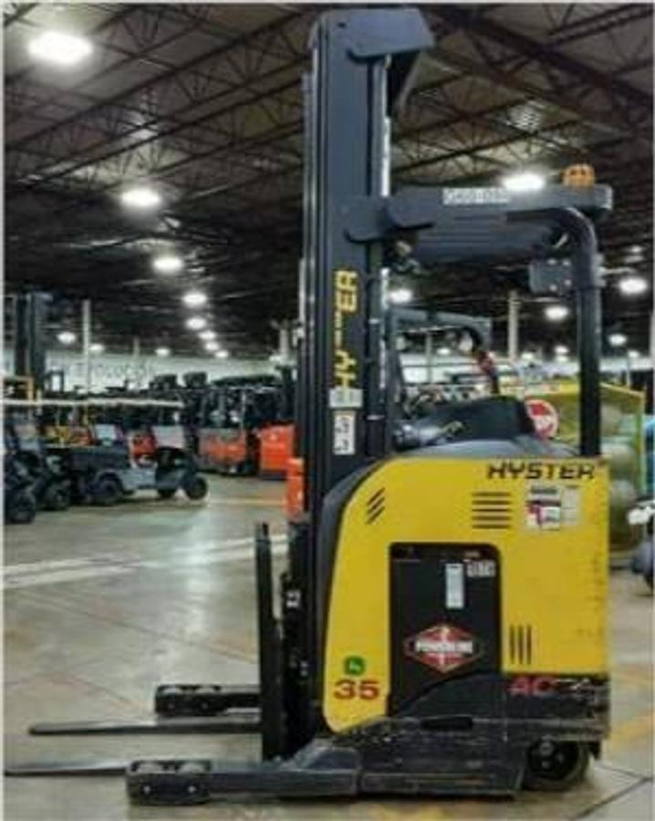 Opposite side view of refurbished 2018 Hyster N35ZR2 electric reach truck showing counterweight, operator compartment, 272" mast, reach carriage, cushion tires, and CSA certification decal during Ontario deployment.