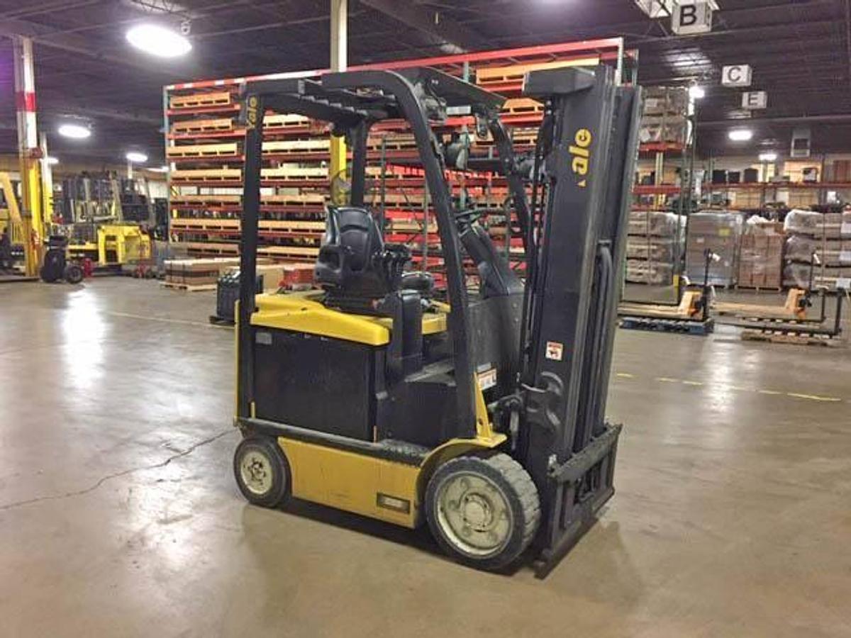 Side view of refurbished 2016 Yale ERC050VGN electric forklift showing operator cab, chassis, and triple mast during Brampton deployment
