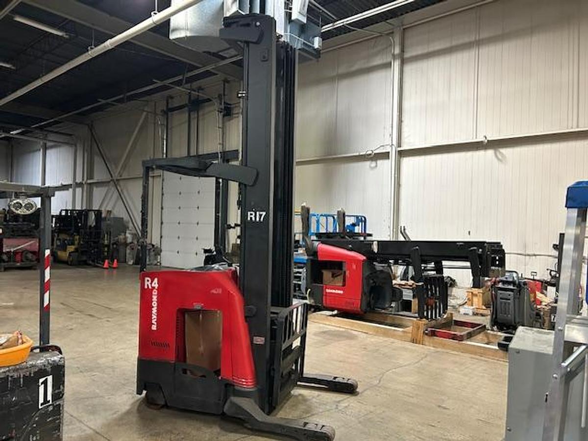 “Raymond 750‑R45TT stand‑up reach truck front angle side view – 336-inch triple mast, sideshift carriage, 4,500 lb electric high‑reach forklift – Brampton ON”