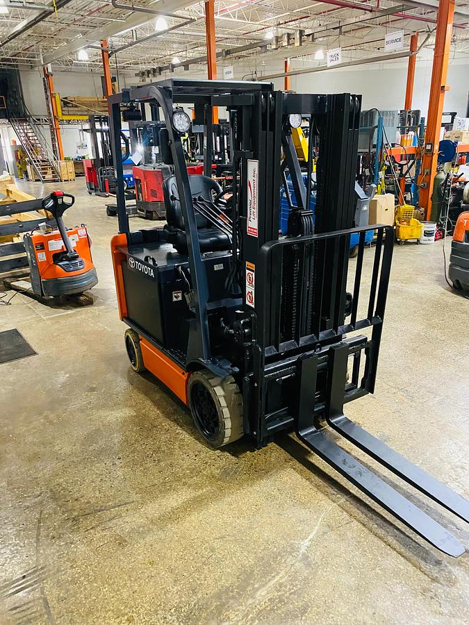 Toyota 8FBCU25 – angled front view from passenger side – mast, forks, and chassis – CSA/MOL certified electric forklift – Brampton ON