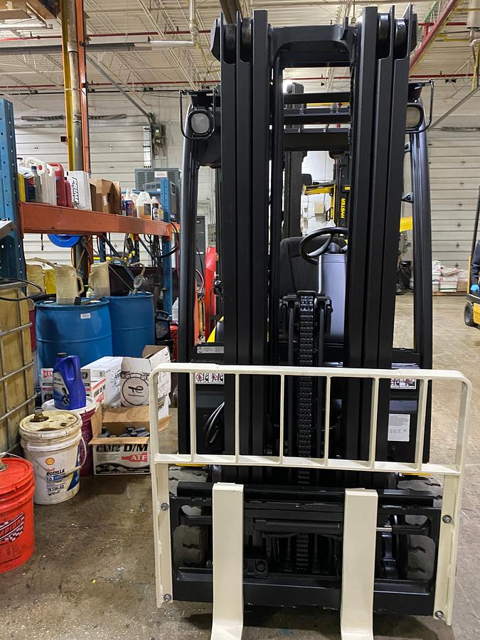 view of 3 stage mast with load backrest and forks