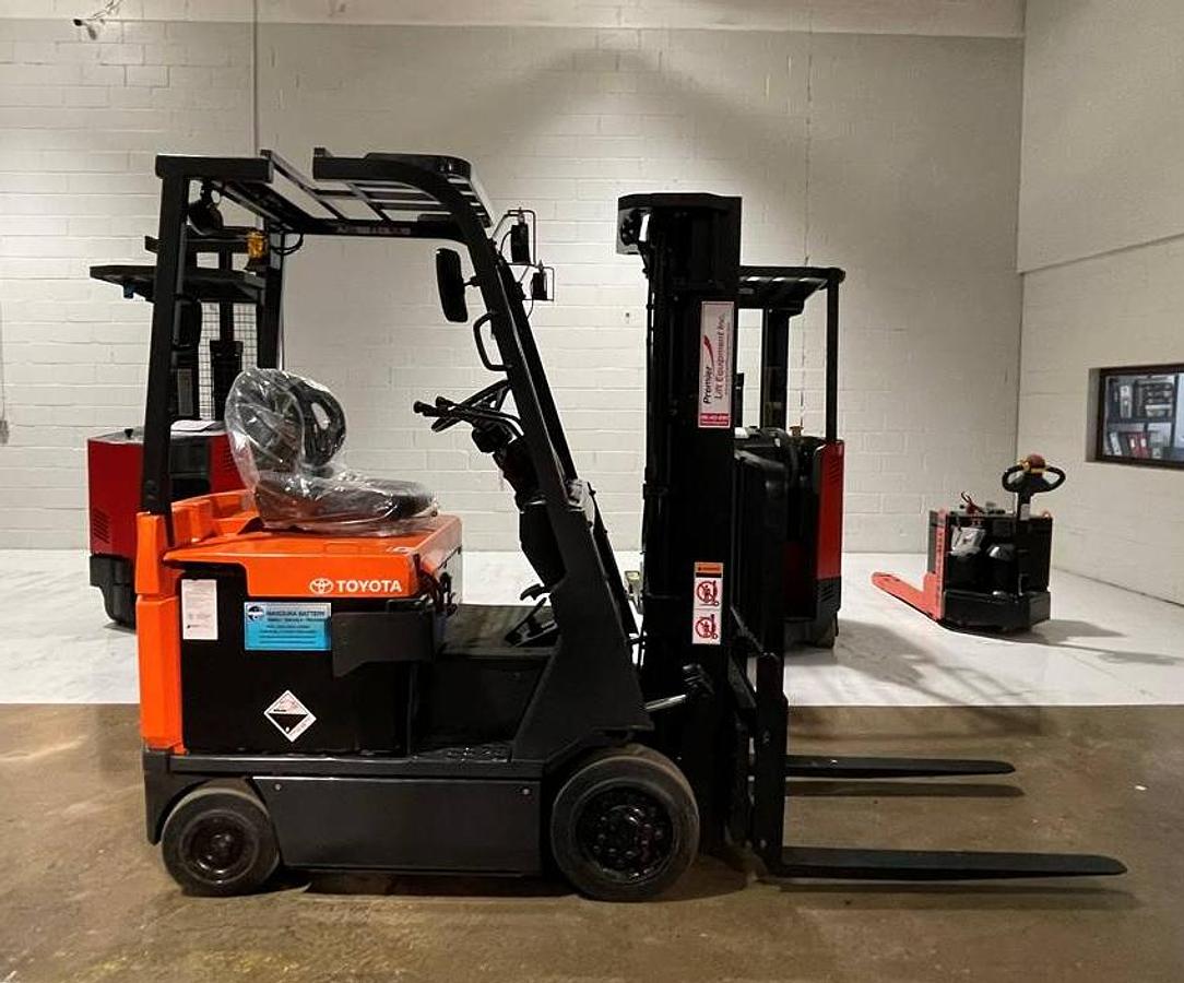 Opposite side view of 2019 Toyota 7FBCU18 electric forklift – CSA-certified 3,500 lb 4-wheel chassis with 189” triple mast, clamp-ready 4-way hydraulics, and cushion tires shown reconditioned with used 36V battery option available in Brampton ON – Premier Lift Equipment
