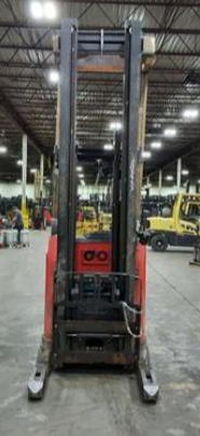 Front angled view showing mast rails and compact chassis profile