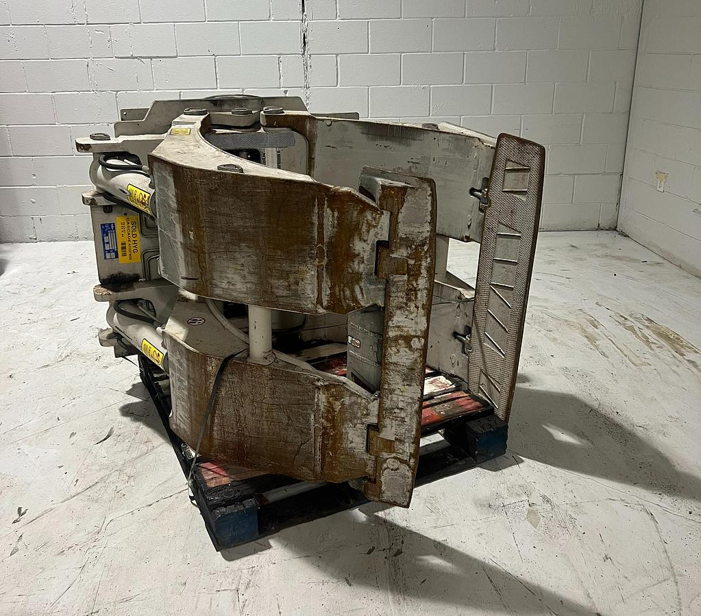 alt="Front angled view of Cascade 90F‑RCS‑254 paper roll clamp showing curved pads and Class IV mounting"