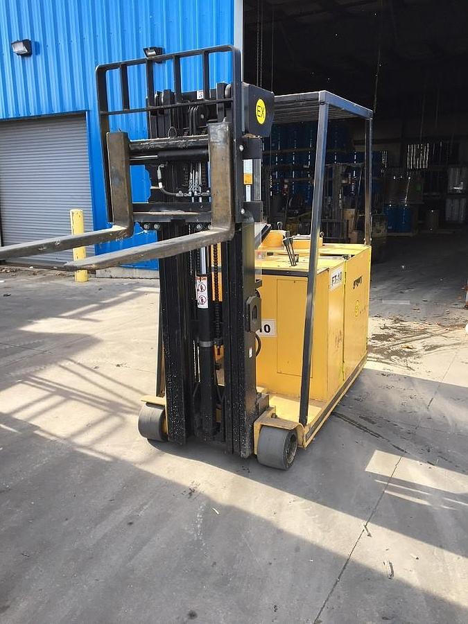 Front angled view of refurbished 2008 Gregory RC4EX EX rated explosion‑proof dockstocker showing forks, mast, battery compartment, and CSA certification decal during Brampton deployment.