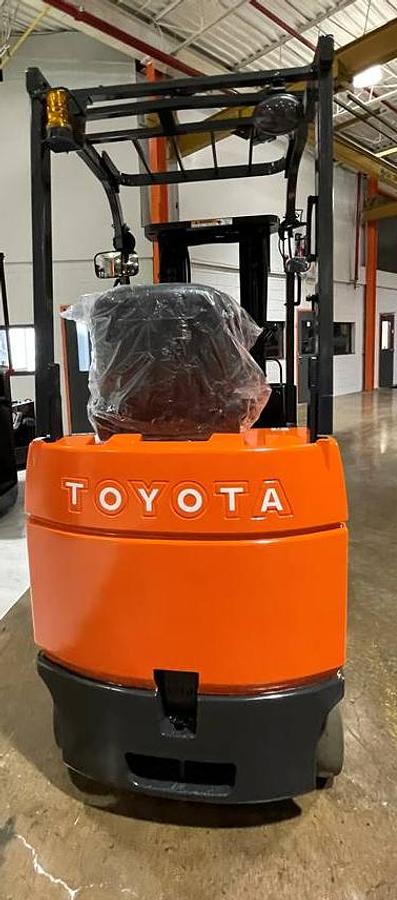 Back view of 2019 Toyota 7FBCU18 electric forklift – CSA-certified 3,500 lb 4-wheel chassis with rear counterweight, overhead guard, and cushion tires shown reconditioned with used 36V battery option available in Brampton ON – Premier Lift Equipment